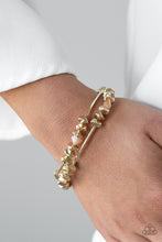 Load image into Gallery viewer, Get The GLOW On The Road - Gold Bracelet - Paparazzi Jewelry