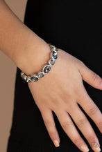 Load image into Gallery viewer, Still GLOWING Strong - Silver Bracelet - Paprazzi Jewelry