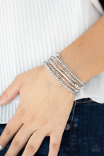 Load image into Gallery viewer, Head-Turning Twinkle - Silver Bracelet - Paparazzi Jewelry