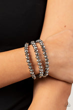 Load image into Gallery viewer, Supernova Sultry - Silver Bracelet - Paparazzi Jewelry