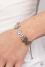 Load image into Gallery viewer, Put a WING on It - Silver Bracelet - Paparazzi Jewelry