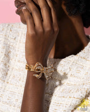 Load image into Gallery viewer, Its All A-BOW-t Me - Gold Bracelet - Paparazzi Jewelry
