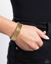 Load image into Gallery viewer, Coiled Command - Gold Bracelet - Paparazzi Jewelry
