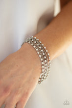 Load image into Gallery viewer, Thats a Smash! - White Bracelet - Paparazzi Jewelry
