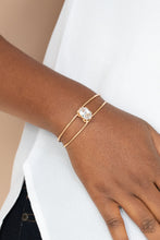 Load image into Gallery viewer, GLOW No Mercy - Gold Bracelet - Paprazzi Jewelry
