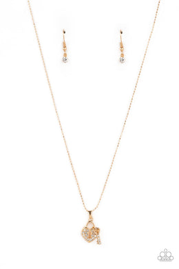 paparazzi-accessories-you-hold-my-heart-gold-necklace